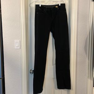 Like new. Wrangler Q-baby black womens jeans- size 9/10 x 36. No fading.